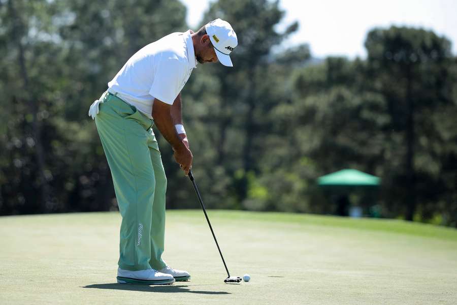 Jason Day puts on the 18th green at Augusta National Golf Club.