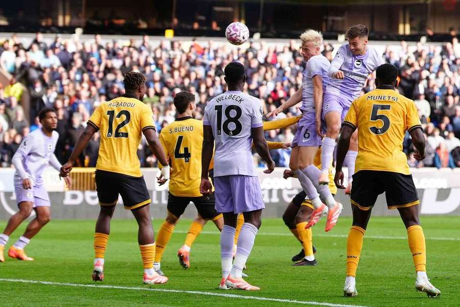 Brighton and Hove Albion's Jan Paul van Hecke (6) scores their equaliser