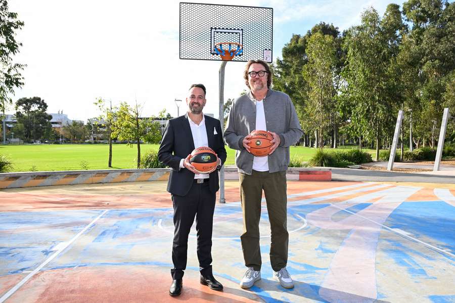 NBL CEO Dave Stevenson poses with Sydney Kings owner Luc Longley at a media opportunity in Perth on Monday.