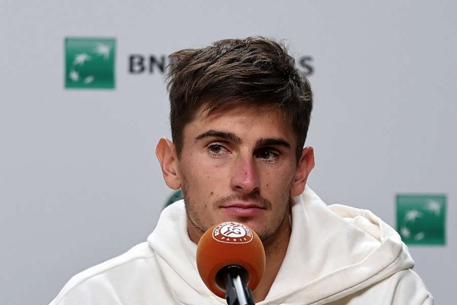 Cobolli speaks to the media ahead of the French Open final