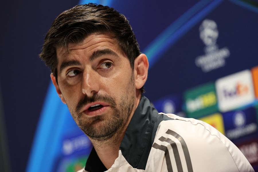 Real Madrid's Belgian goalkeeper #01 Thibaut Courtois speaks during a press conference at the Emirates Stadium