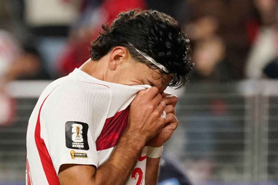 Turkey's Can Uzun reacts after the defeat