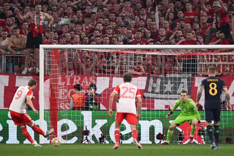 Bayern Munich's Harry Kane rolls home his penalty in the Champions League semi-final first leg against Real Madrid