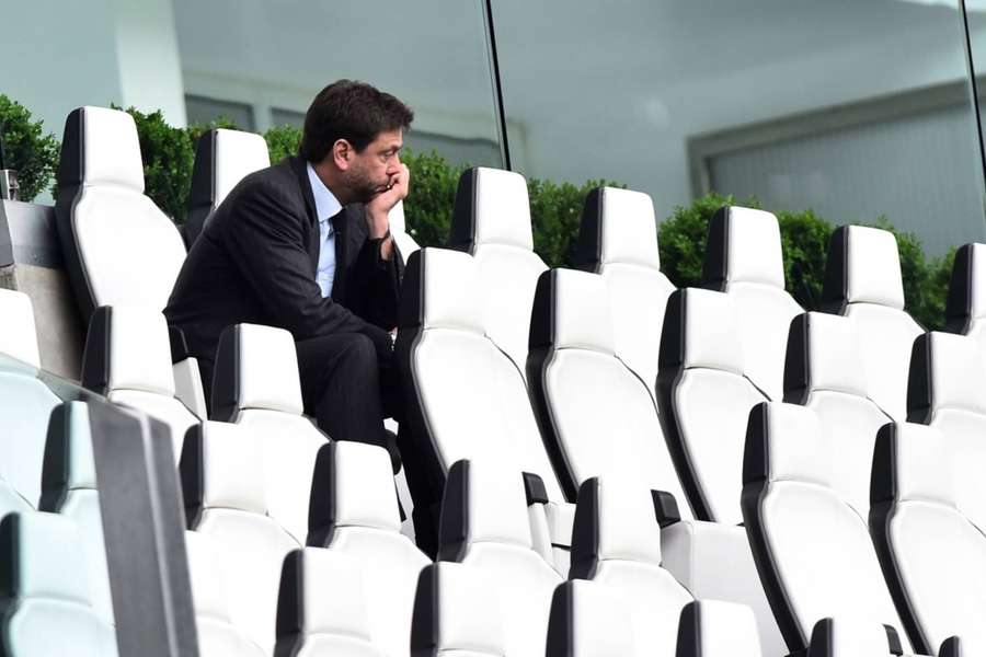 Juventus president Andrea Agnelli sits alone ahead of a match.