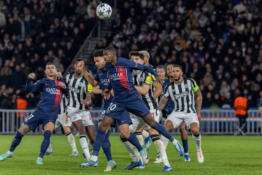 PSG's Ousmane Dembele fights for the ball in a previous encounter against Newcastle