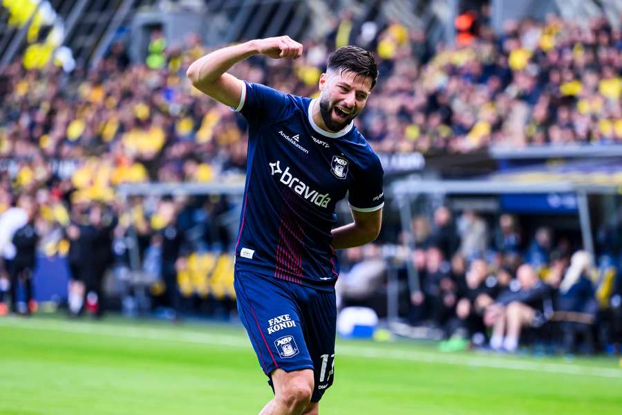 Iraqi international midfielder Kevin Yakob celebrates after scoring against Brondby Iraqi international midfielder Kevin Yakob celebrates after scoring against Brondby