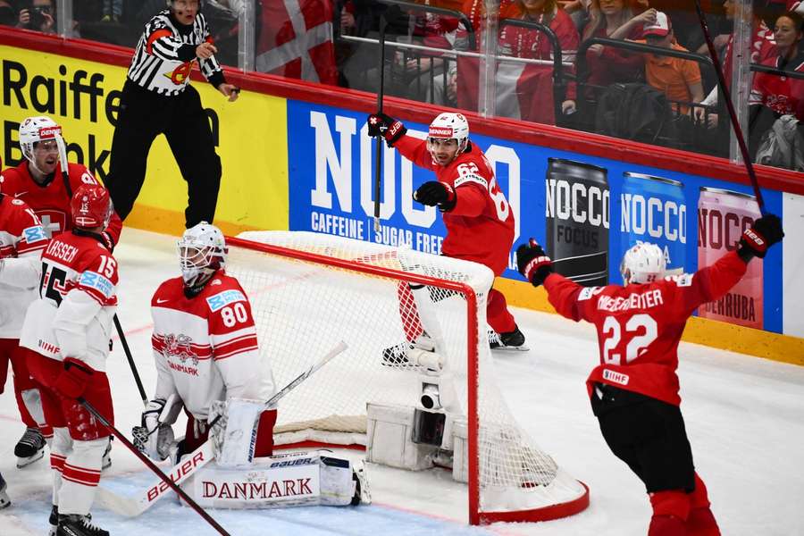 Nino Niedenreiter celebrates giving Switzerland the lead
