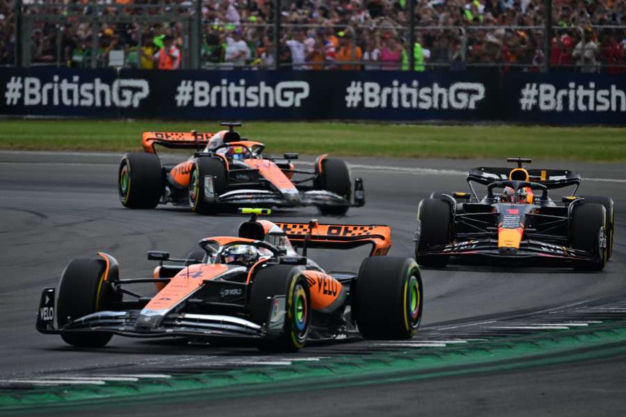 McLaren's British driver Lando Norris leads ahead of Red Bull Racing's Dutch driver Max Verstappen and McLaren's Australian driver Oscar Piastri 