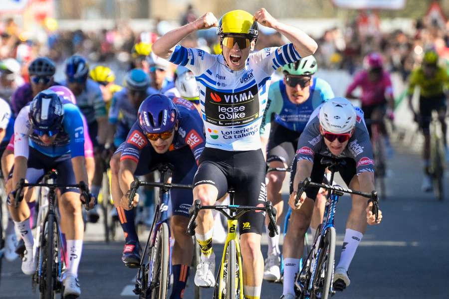 Matthew Brennan celebrates as he crosses the finish line