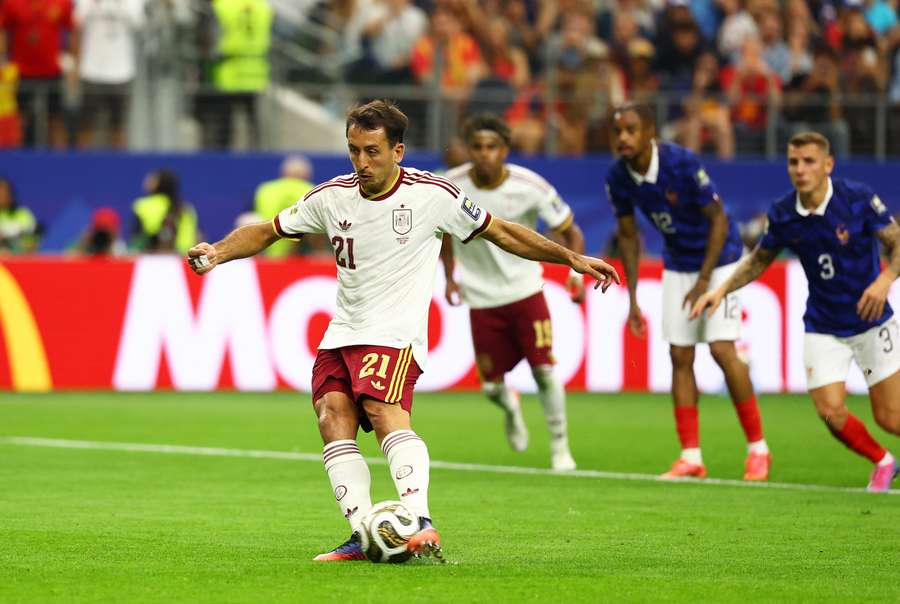 Mikel Oyarzabal scores the first goal from the penalty spot