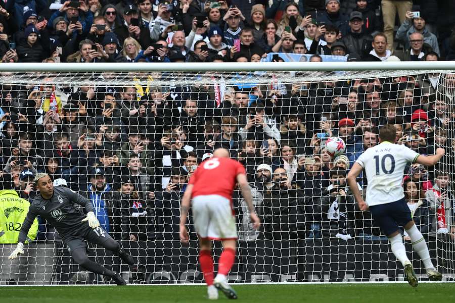 Kane fires his penalty into the roof of the net