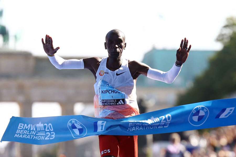 Kenya's Eliud Kipchoge crosses the finish line to win the Berlin Marathon
