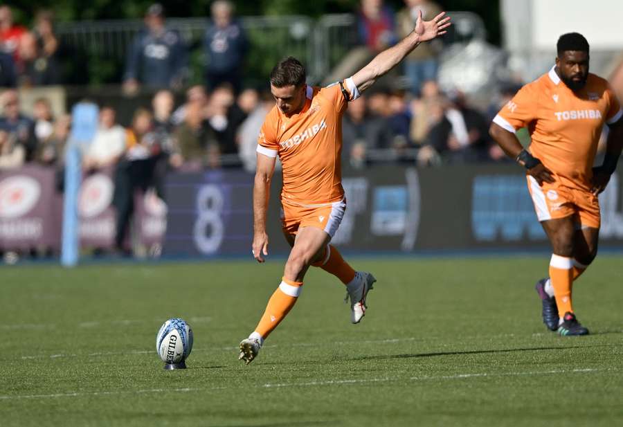 George Ford (Sale Sharks) kicks during the match