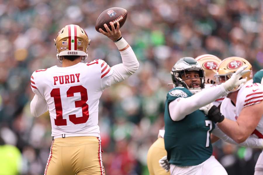 Brock Purdy #13 of the San Francisco 49ers throws a pass against the Philadelphia Eagles during the first quarter 