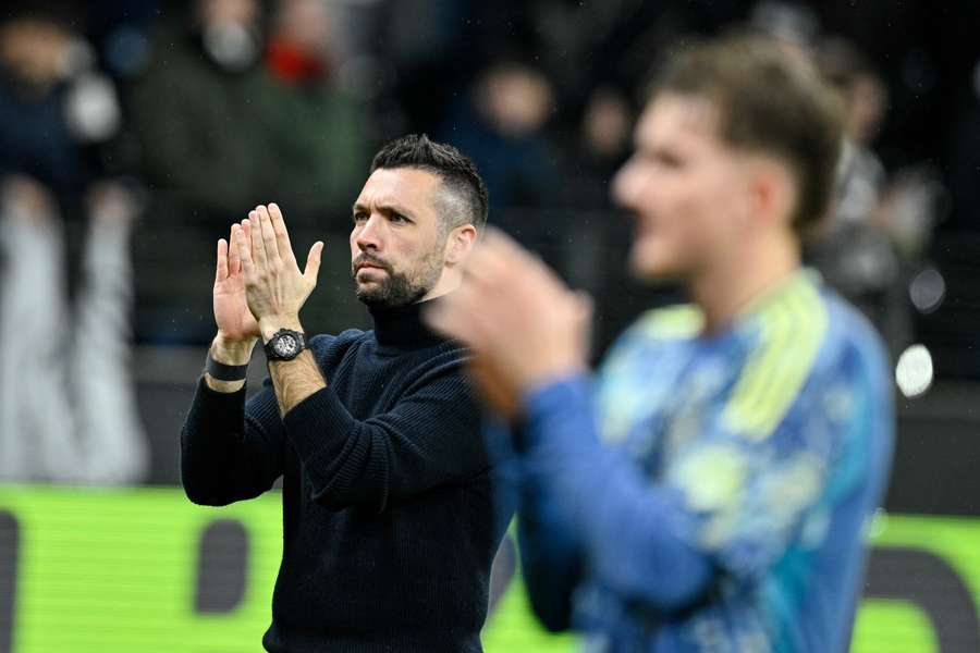 Ajax manager Francesco Farioli applauds the away support after the UEFA Europa League match against Eintracht Frankfurt