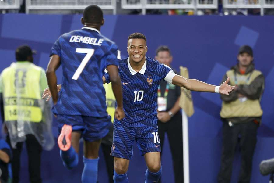 Mbappe celebrates with Dembele