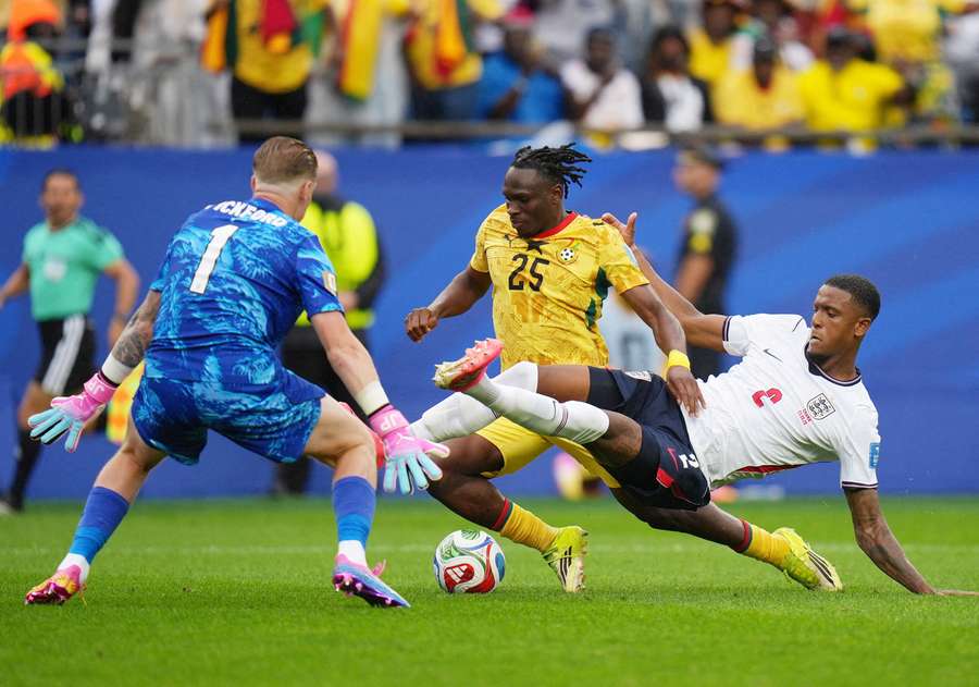 Ghana's Prince Kwabena Adu in action with England's Ezri Konsa and Jordan Pickford