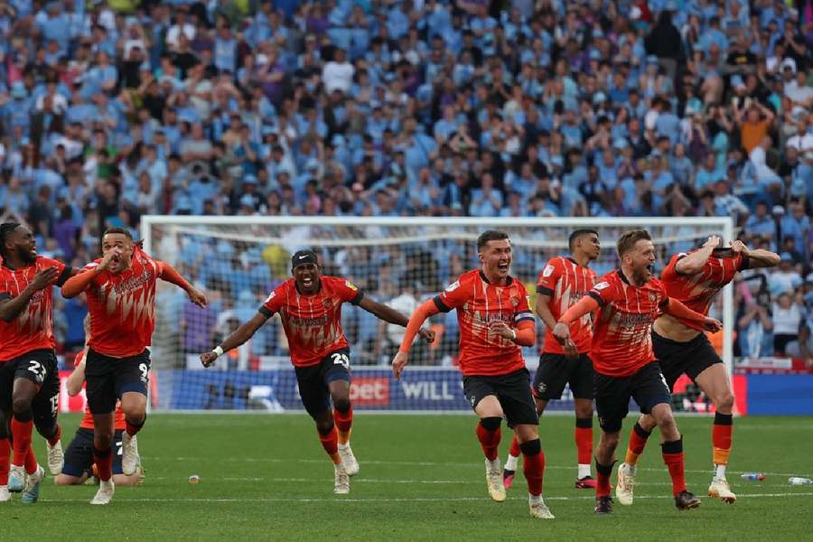 Luton celebrate winning the shootout