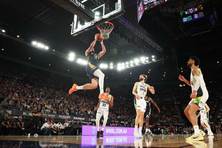 Karlo Matković of the New Orleans Pelicans dunks during the New Orleans Pelicans' pre-season win over Australia's South East Melbourne Phoenix.
