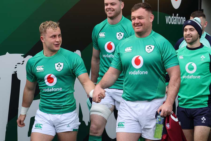 Ireland's scrum-half Craig Casey and Ireland's prop Dave Kilcoyne hold hands as they arrive to take part in a training session Ireland's scrum-half Craig Casey and Ireland's prop Dave Kilcoyne hold hands as they arrive to take part in a training session