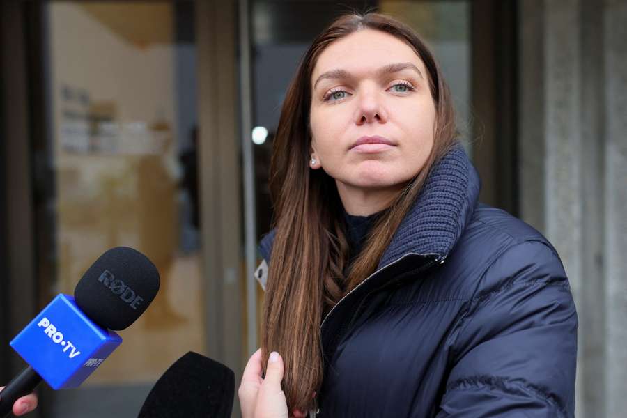 Simona Halep addresses the media after a hearing for a doping case against her at the Court of Arbitration for Sport