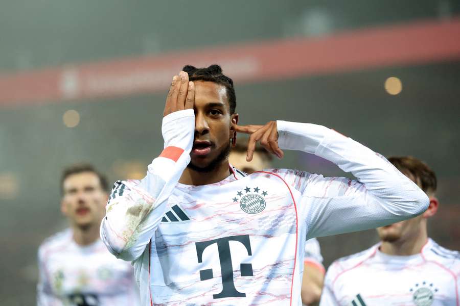 Michael Olise celebrates his goal against Heidenheim