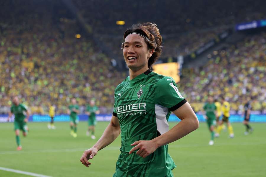 Borussia Monchengladbach's Ko Itakura celebrates scoring against Borussia Dortmund
