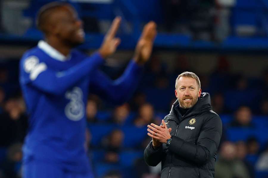 Chelsea's Graham Potter celebrates in midweek at Stamford Bridge