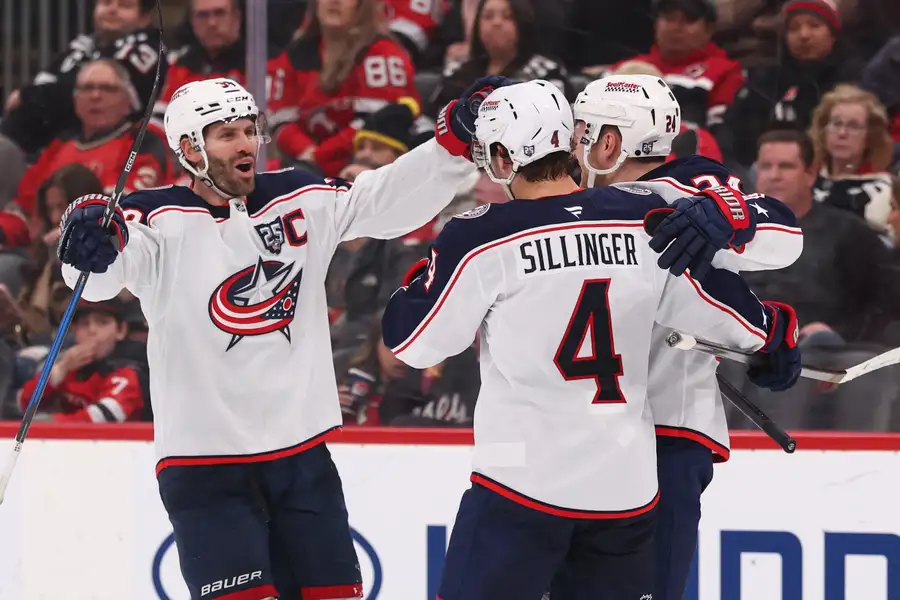 Blue Jackets players celebrate a goal against the New Jersey Devils (2026)