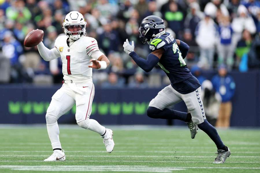 Cardinals QB Kyler Murray chased by Seahawks CB Devon Witherspoon (2024)
