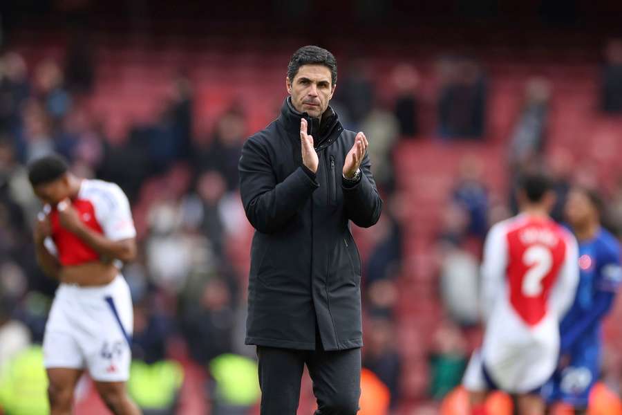 Mikel Arteta applauds supporters at the end of the English Premier League match between Arsenal and Chelsea