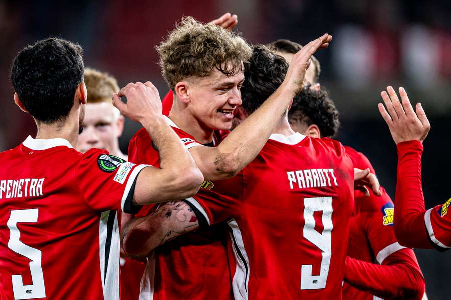 AZ's Sven Mijnans celebrates scoring the 2-0 against FC Noah