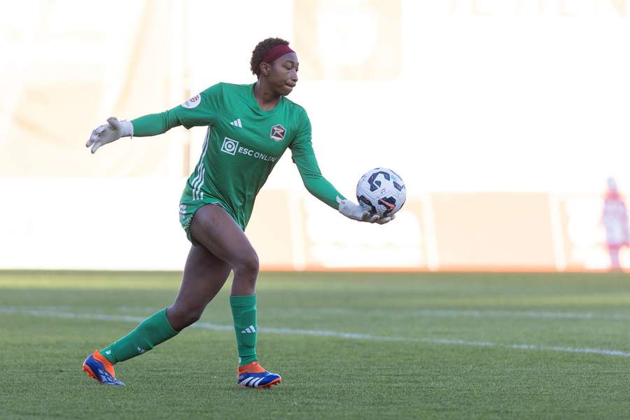 Michaely Bihina in the Racing Power jersey against Benfica in March 2025 Michaely Bihina in the Racing Power jersey against Benfica in March 2025