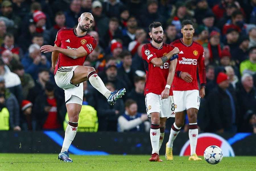 Sofyan Amrabat (L) of Manchester United reacts after the opening goal against Bayern Munich
