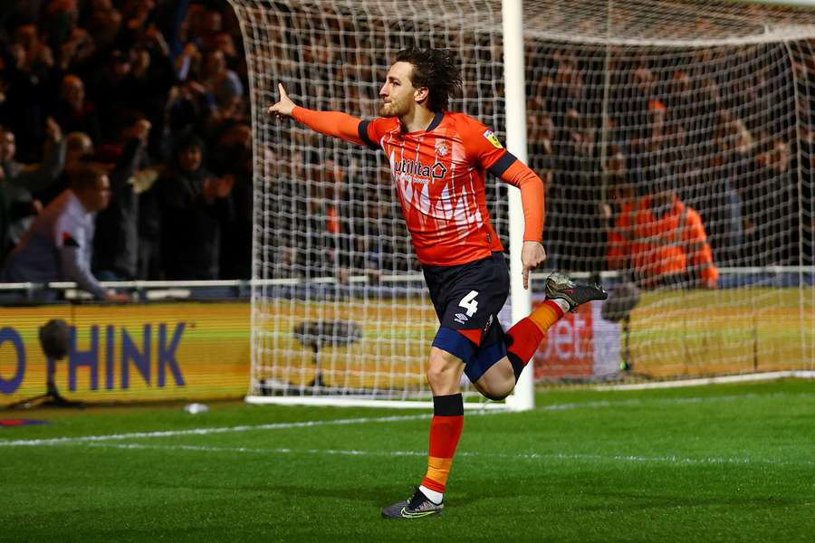 Tom Lockyer celebrates a goal for Luton last season