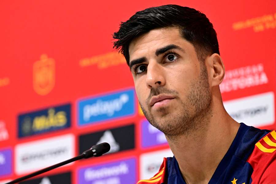 Spain's forward Marco Asensio addresses a press conference in Qatar