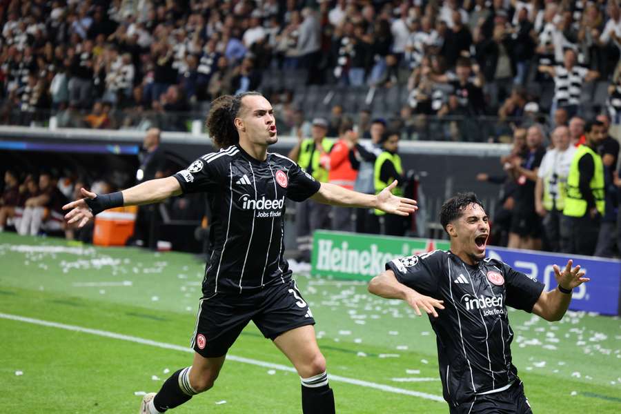 Frankfurt's Fares Chaibi (right) and Arthur Theate celebrate against Galatasaray