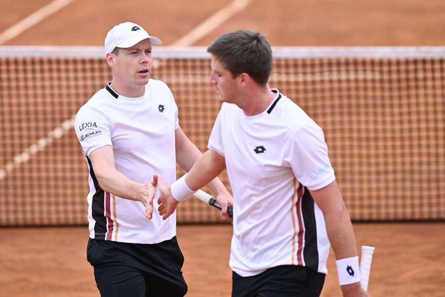 Heliovaara (L) and Patten are through to Round Two Heliovaara (L) and Patten are through to Round Two