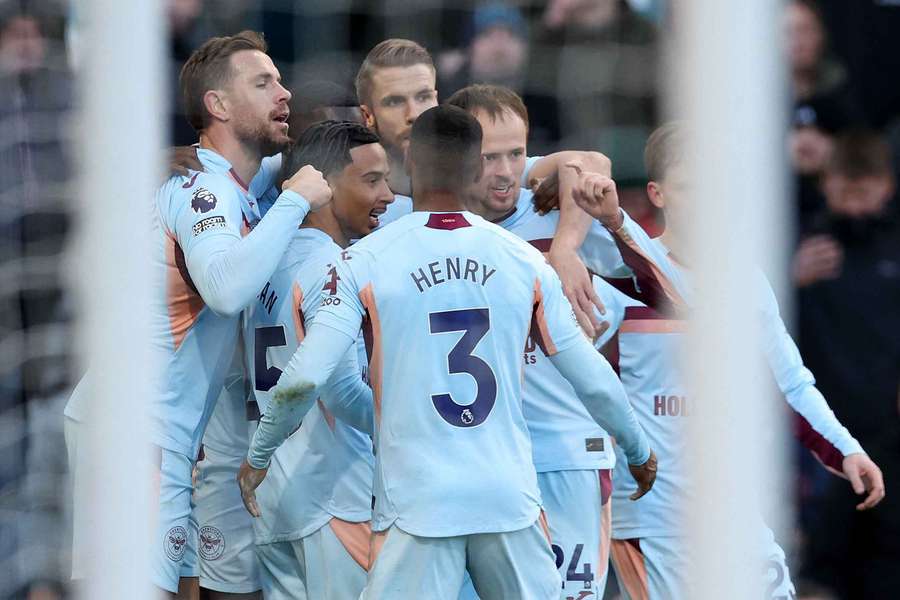 Brentford players celebrate their winner against Burnley