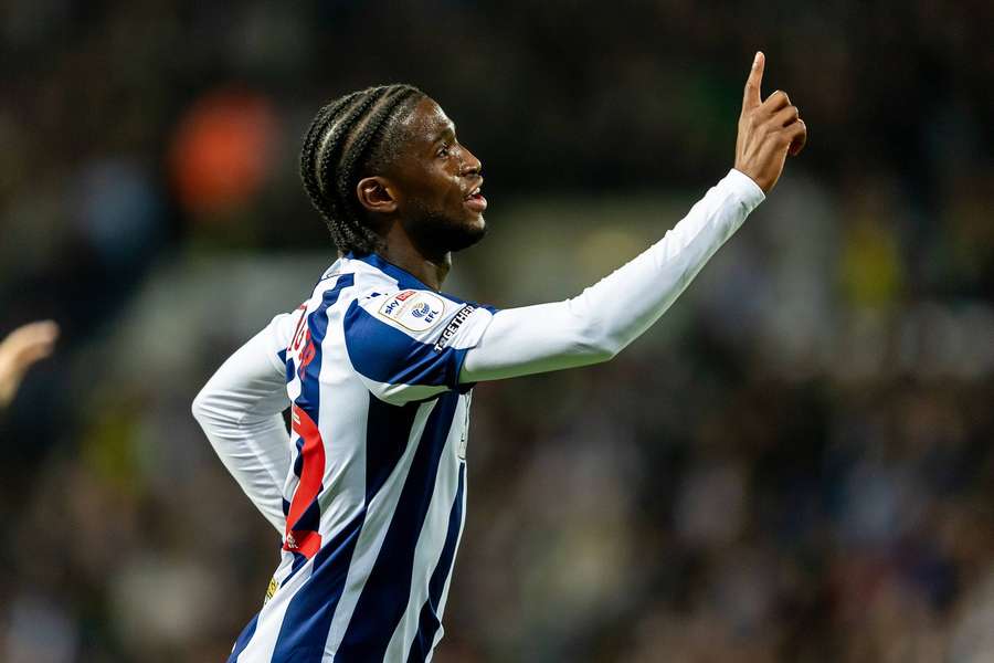 Iling-Junior celebrates after opening the scoring