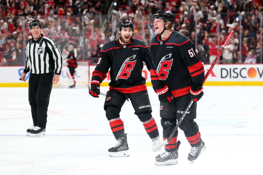 Hurricanes' Jackson Blake (right) and Sean Walker (left) celebrate goal in Game 5 against Montreal Canadiens Hurricanes' Jackson Blake (right) and Sean Walker (left) celebrate goal in Game 5 against Montreal Canadiens