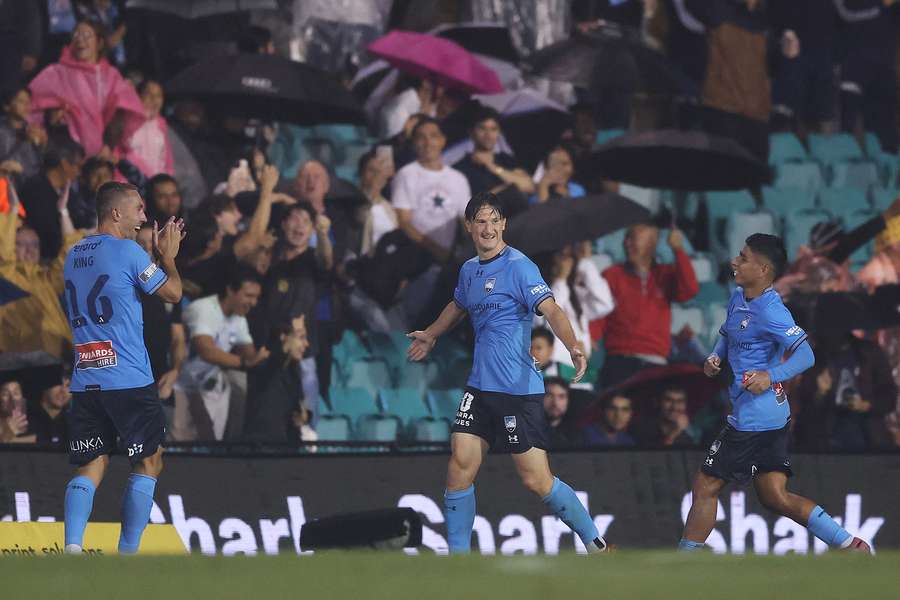 Joe Lolley celebrates his second goal against Melbourne Victory last weekend.