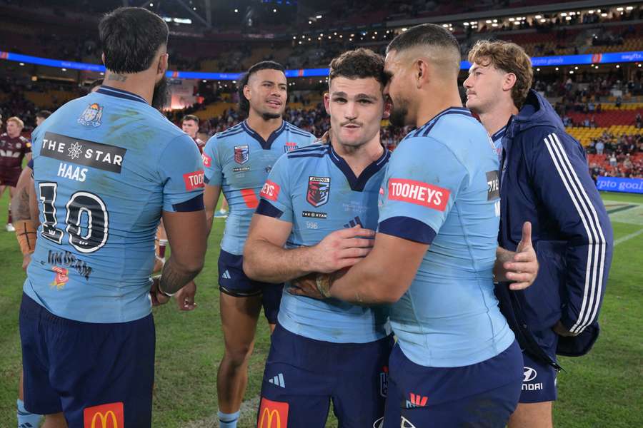 Nathan Cleary and Latrell Mitchell celebrates NSW's Game 1 victory.
