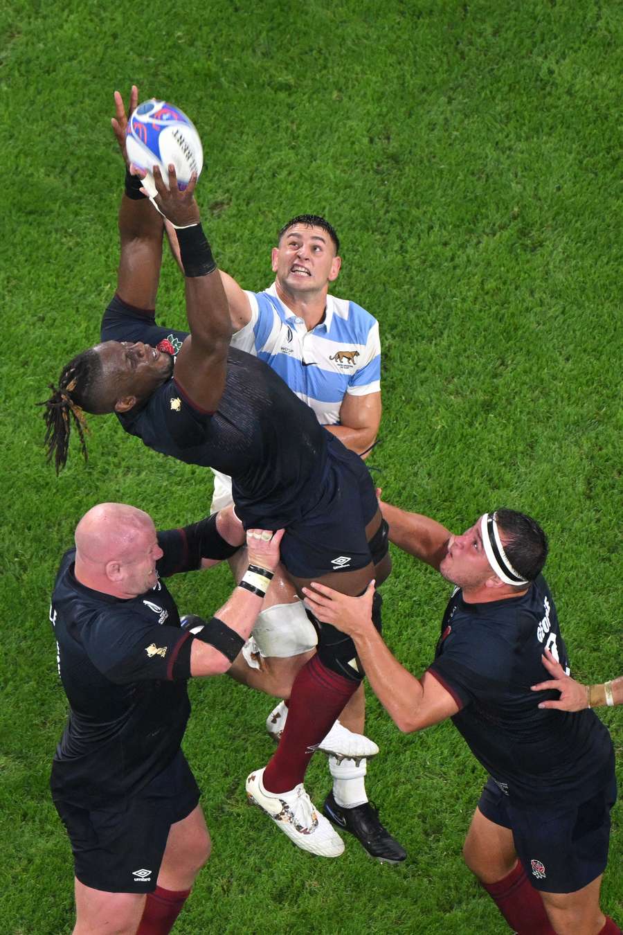 England lock Maro Itoje and Argentina's number eight Juan Martin Gonzalez jump for the ball