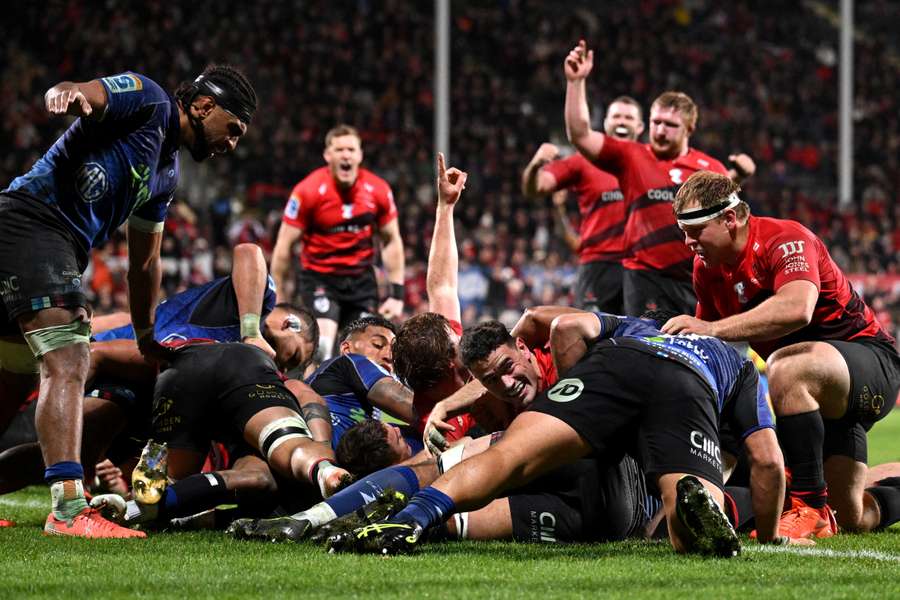 The Crusaders celebrate Will Jordan's first try