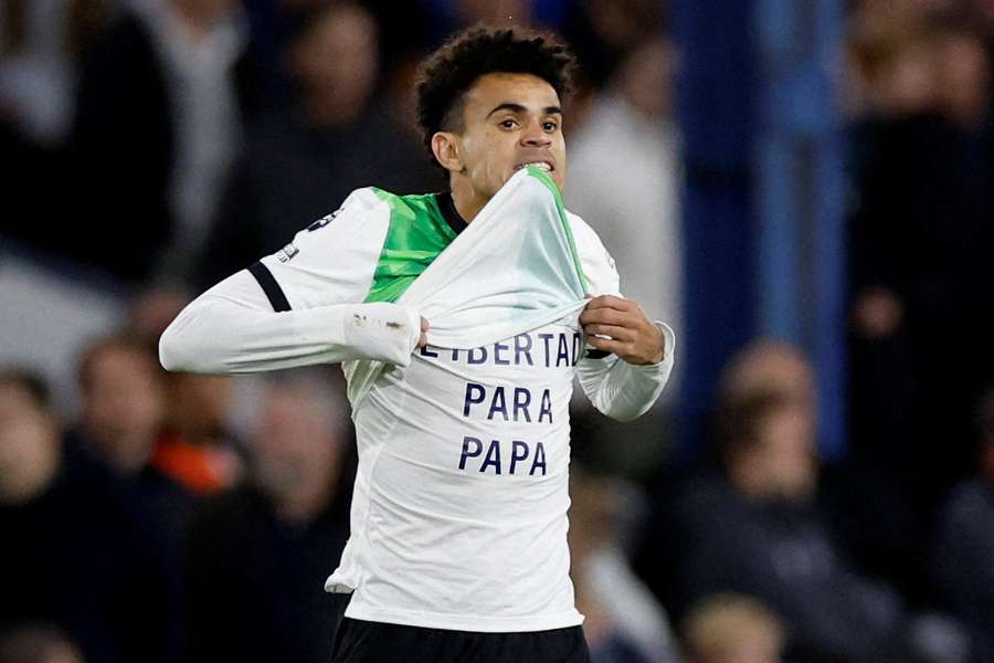 Luis Diaz shows a shirt in support of his father after scoring for Liverpool