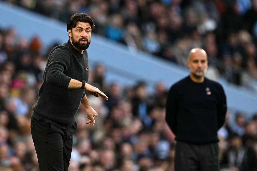 Southampton head coach Russell Martin (L) gestures on the sidelines