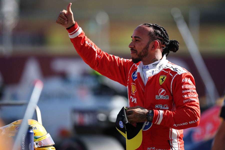 Lewis Hamilton celebrates taking pole Lewis Hamilton celebrates taking pole