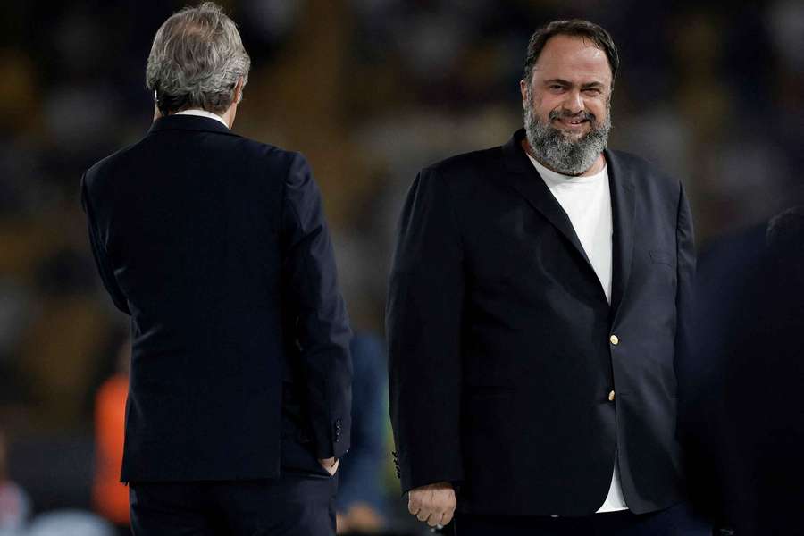 Olympiakos chairman Marinakis (R) will stand trial on misdemeanour charges
