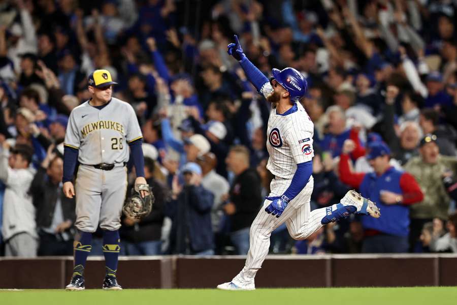 Cubs' Michael Busch reacts after a home run in Game 4 of the 2025 NLDS against the Milwaukee Brewers